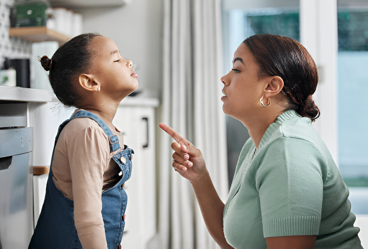 A mother is disciplining her child by taking her away from Public